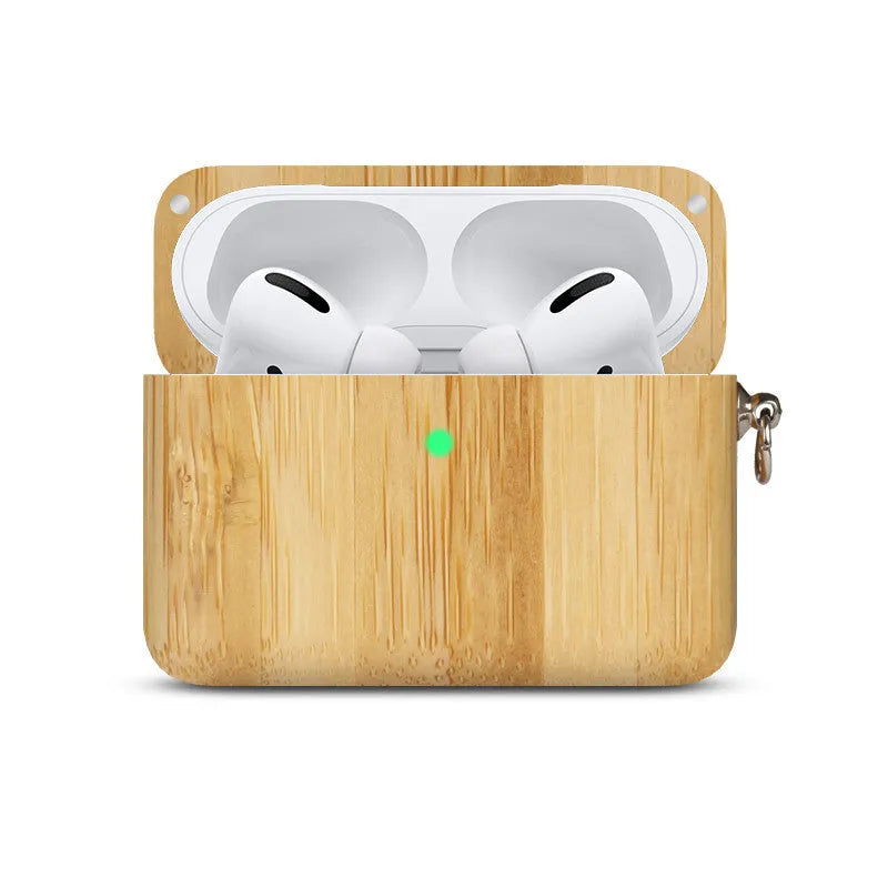 Solid walnut wood protective sleeve for Apple AirPods with attached brown lanyard on a wooden table.