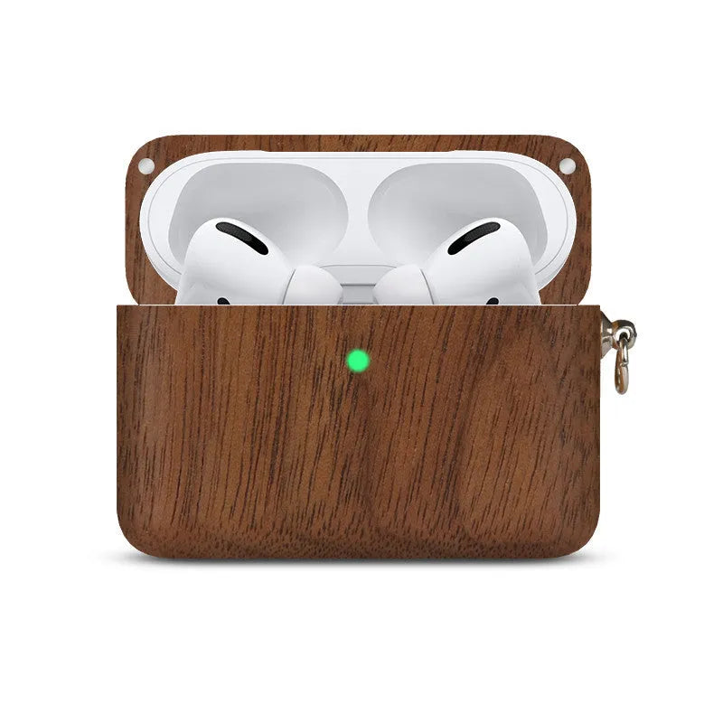 Solid walnut wood protective sleeve for Apple AirPods with attached brown lanyard on a wooden table.