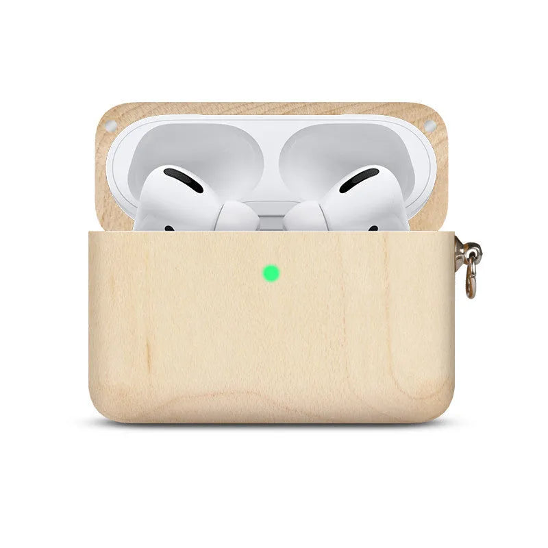 Solid walnut wood protective sleeve for Apple AirPods with attached brown lanyard on a wooden table.