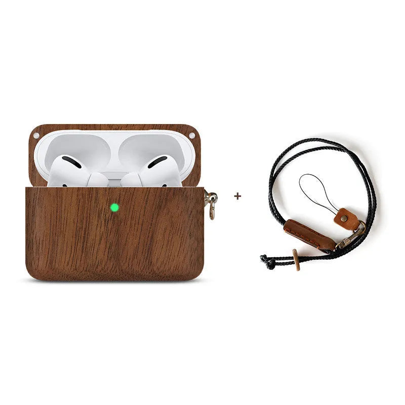 Solid walnut wood protective sleeve for Apple AirPods with attached brown lanyard on a wooden table.