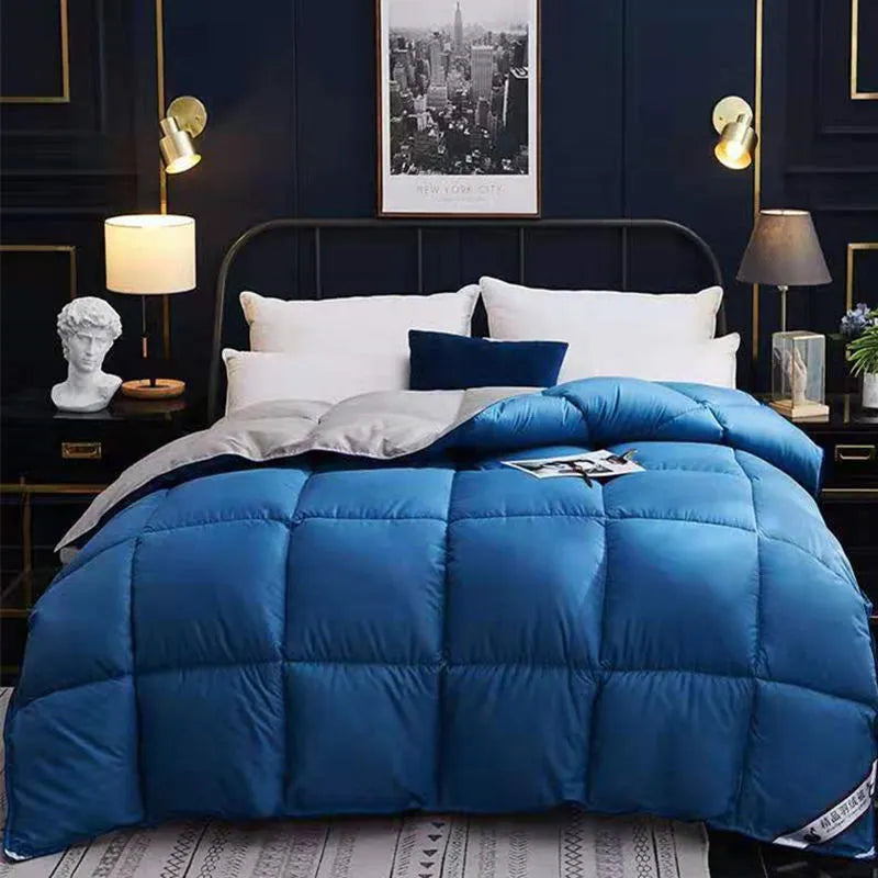 Goose down winter duvet in twill fabric, shown in a choice of colours including white, pink, beige, and grey.