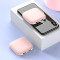 Compact black 20000 mAh mini power bank with LED flashlight on a plastic shell.