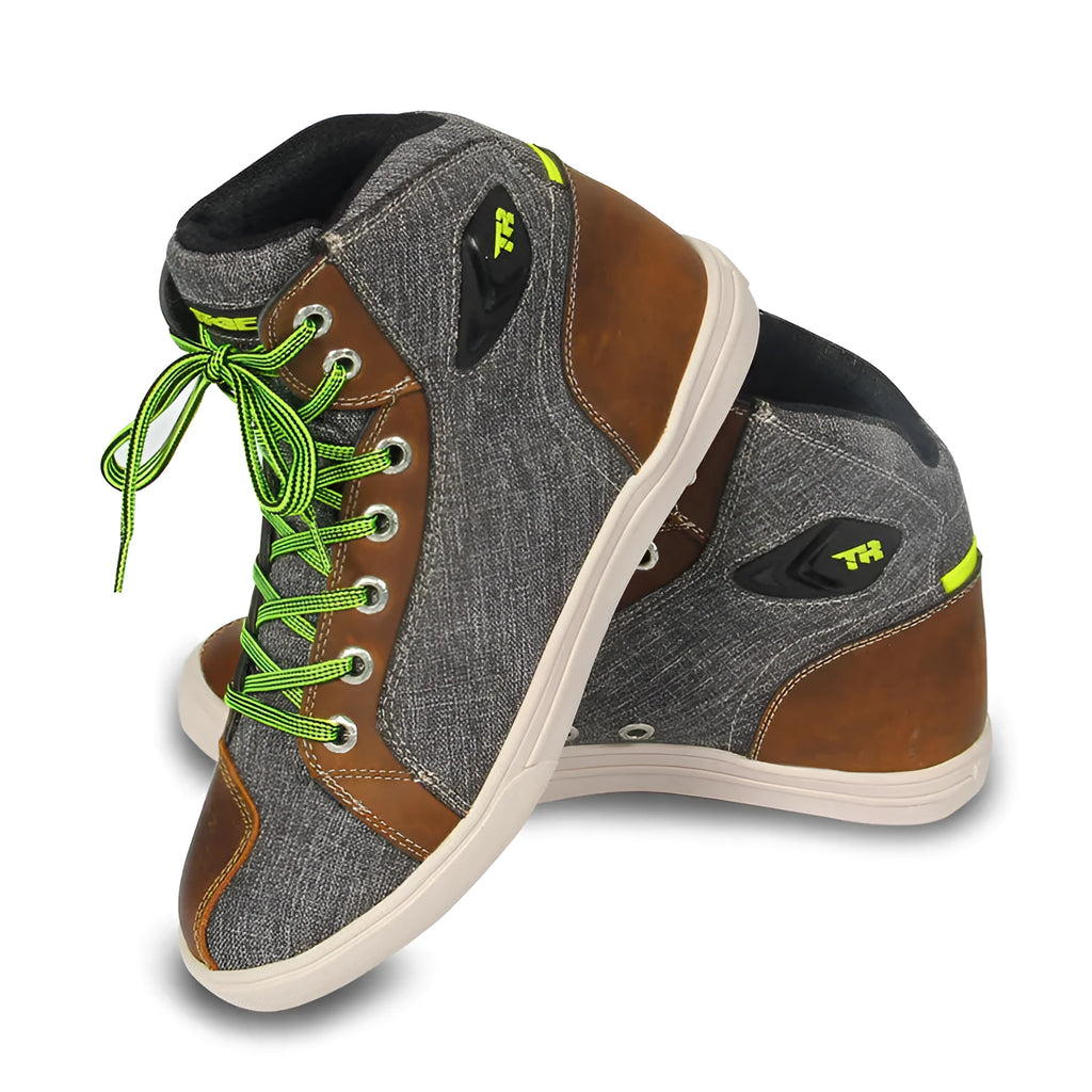 Tiger Boots men's black and grey casual motorcycle short boots with mesh panels on a motorcycle footpeg
