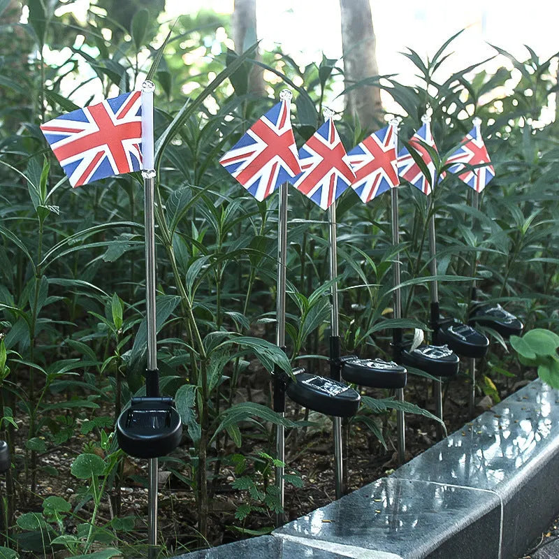 Solar garden flag light with American flag design on stainless steel stake
