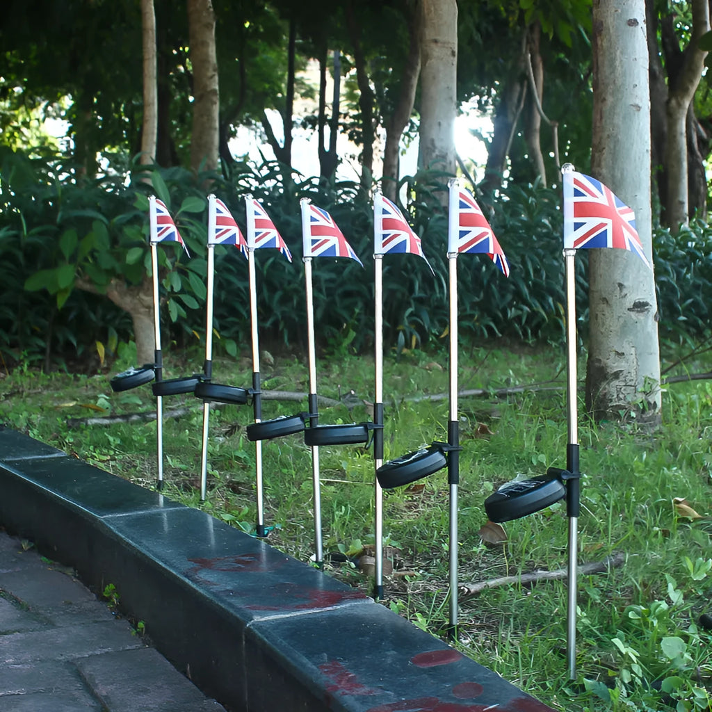 Solar garden flag light with American flag design on stainless steel stake