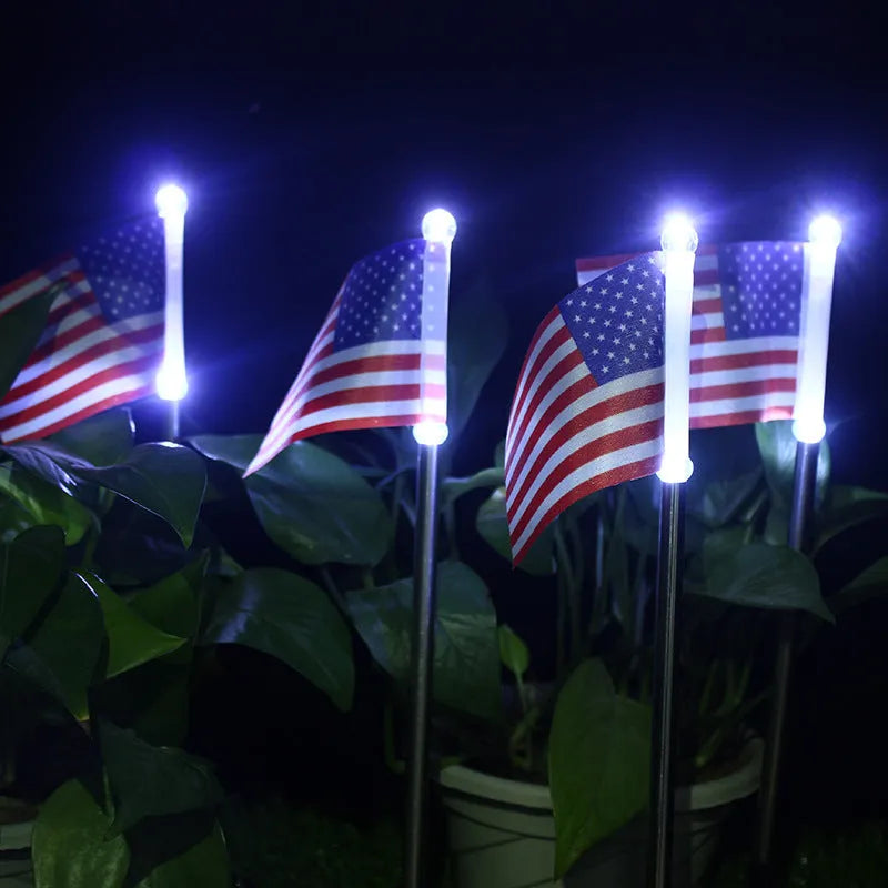 Solar garden flag light with American flag design on stainless steel stake