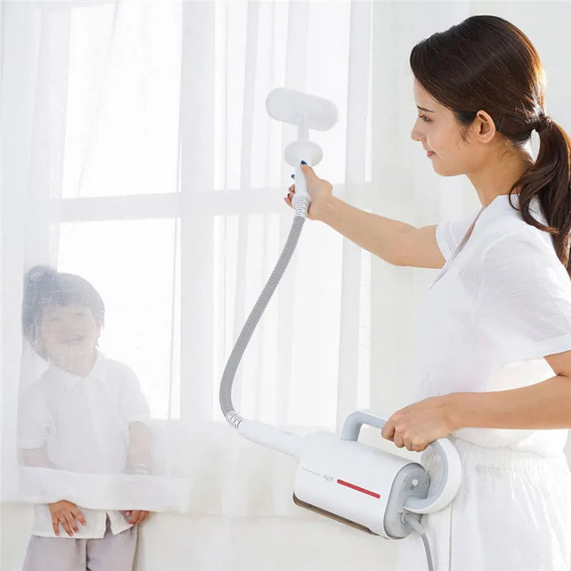 Deerma DEM-ZQ610 white steam cleaner main unit with brush heads and glass scraper attachments