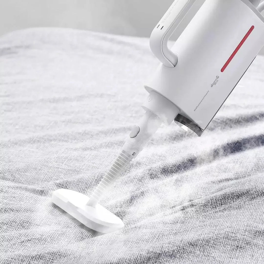 Deerma DEM-ZQ610 white steam cleaner main unit with brush heads and glass scraper attachments