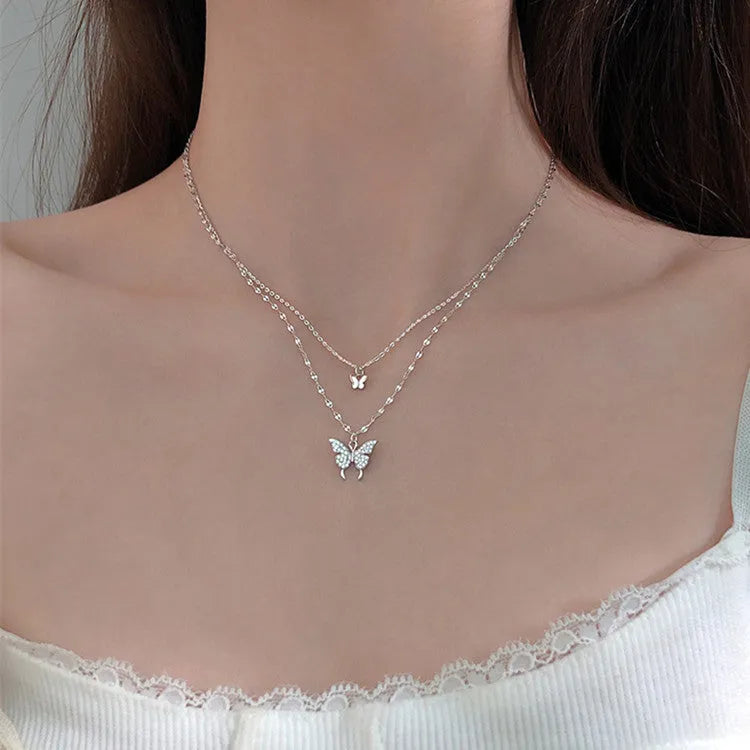 Silver colour butterfly necklace with double layer clavicle chain and copper pendant