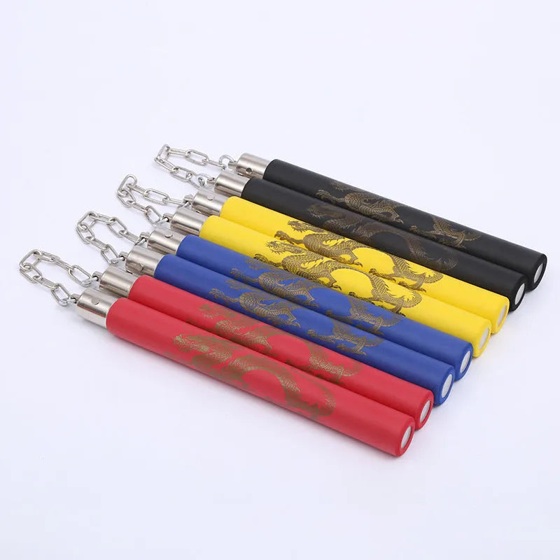 Red and blue foam-padded sponge nunchaku with a connecting chain, showing EVA sponge material on a grey background.