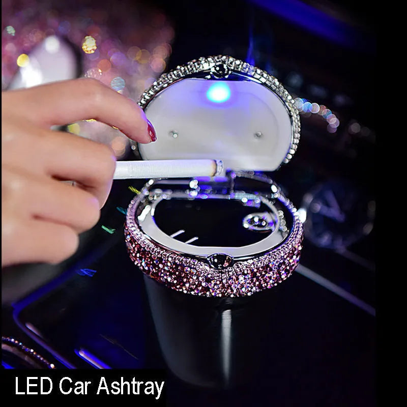 Round crystal diamond car aromatherapy pendant in purple swan style hanging from rearview mirror