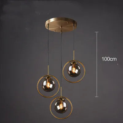 Single head glass chandelier with iron body and adjustable height, transparent glass shade