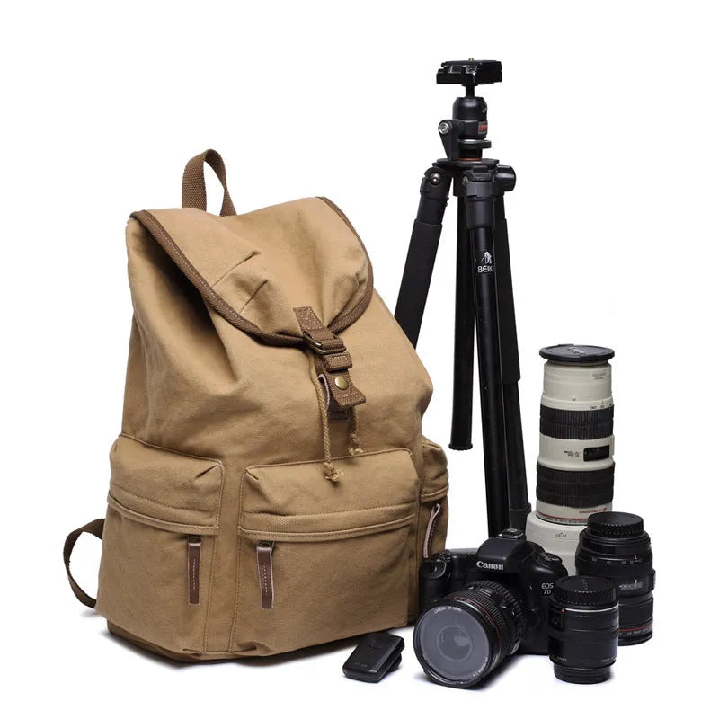 Canvas shoulder camera bag in grey or khaki with cover opening, soft handle, and included rain cover