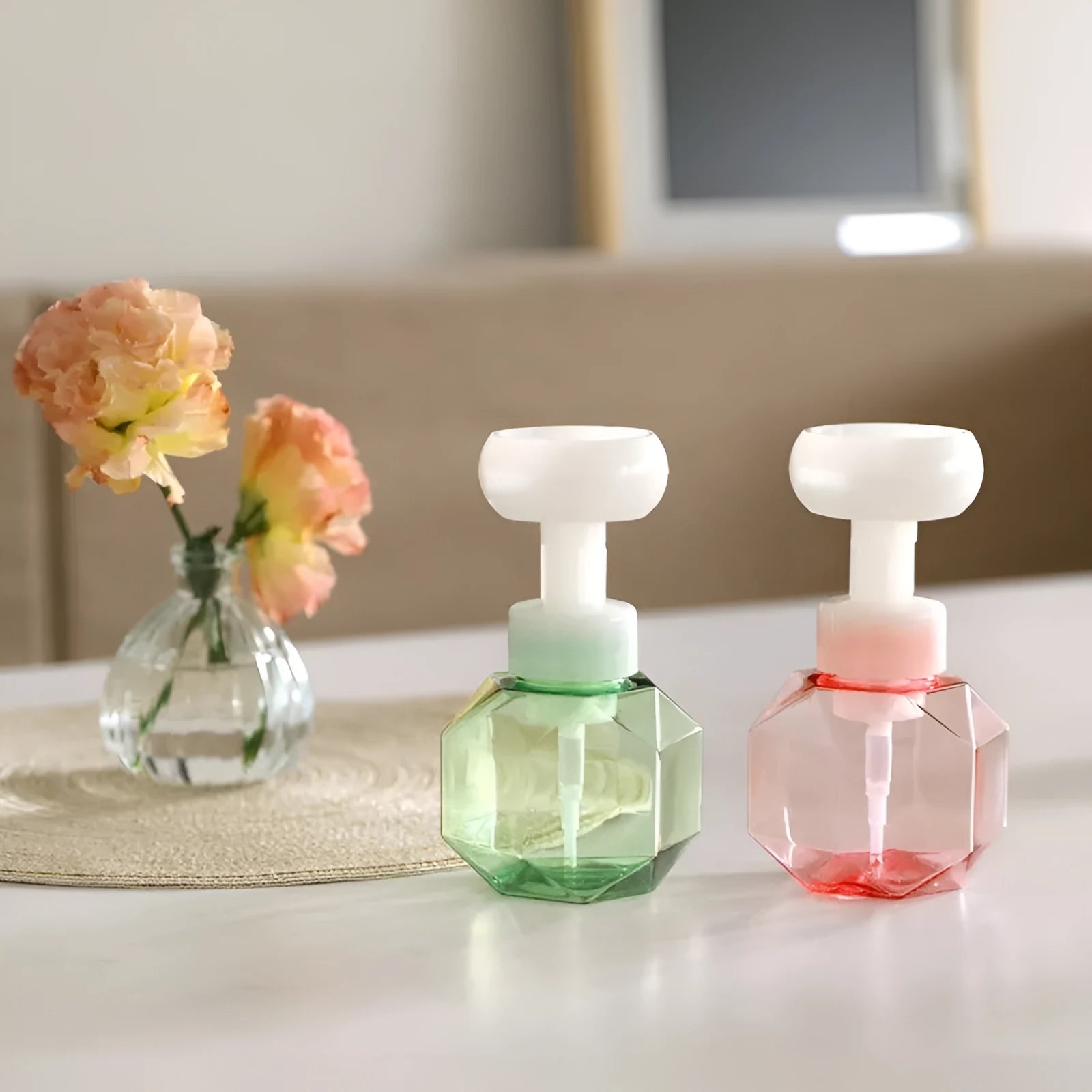 Empty plastic foaming bottle with pump spray top in blue, green, pink and yellow colour options.