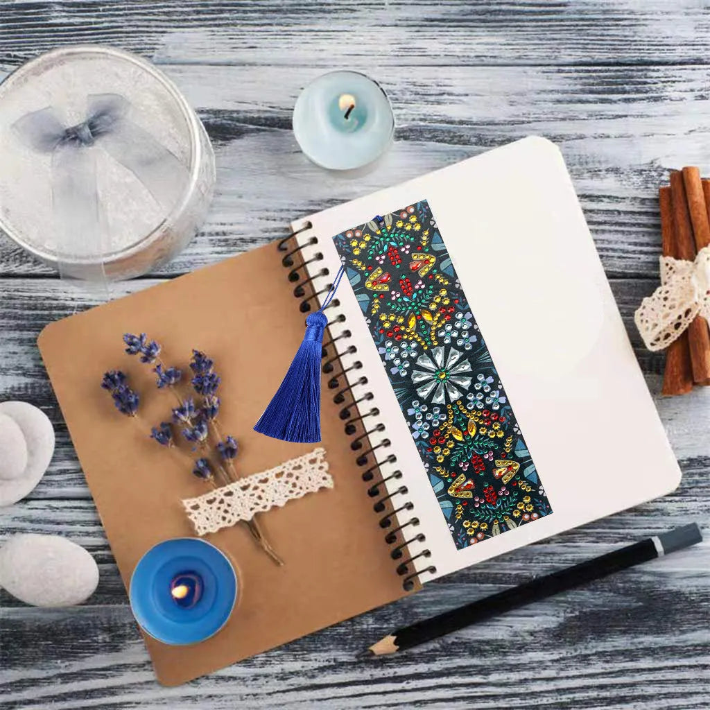 Handmade leather bookmark with diamond embroidered mandala flower design.