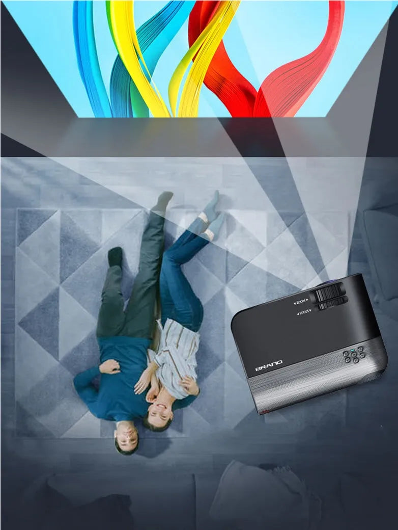 Portable wireless projector with AI voice control on a table, projecting a movie scene onto a wall.