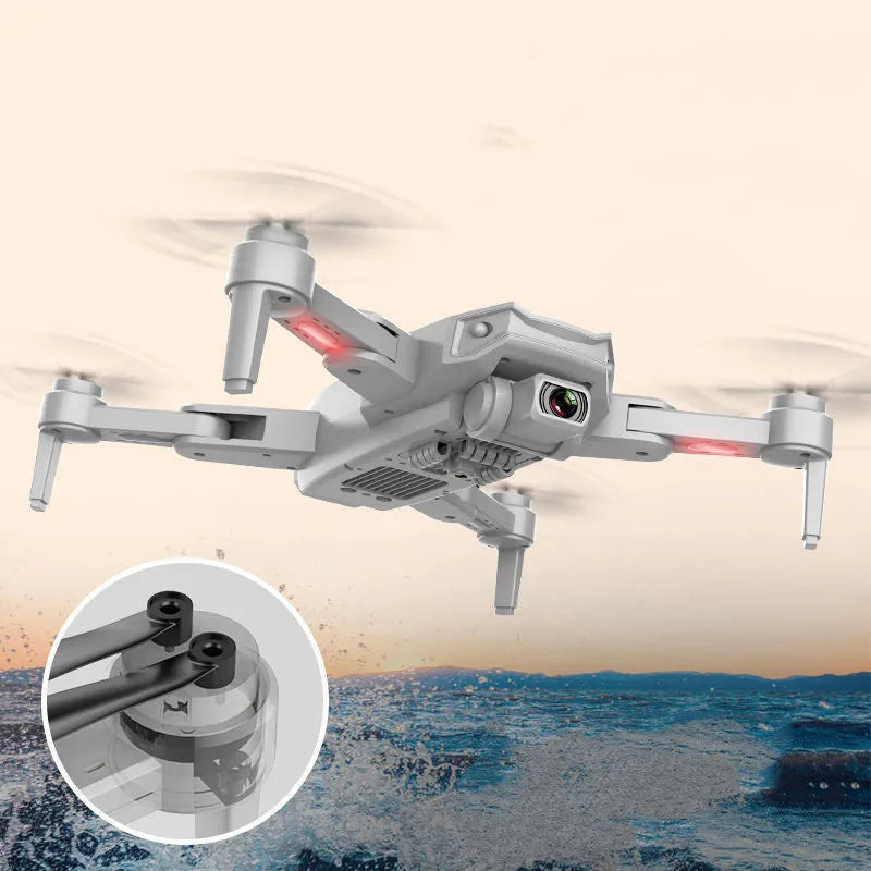 Orange GPS drone with 6K dual camera, brushless motor, foldable arms and remote control, shown with spare propellers