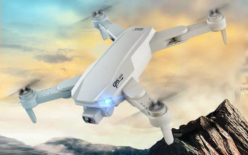 Orange GPS drone with 6K dual camera, brushless motor, foldable arms and remote control, shown with spare propellers