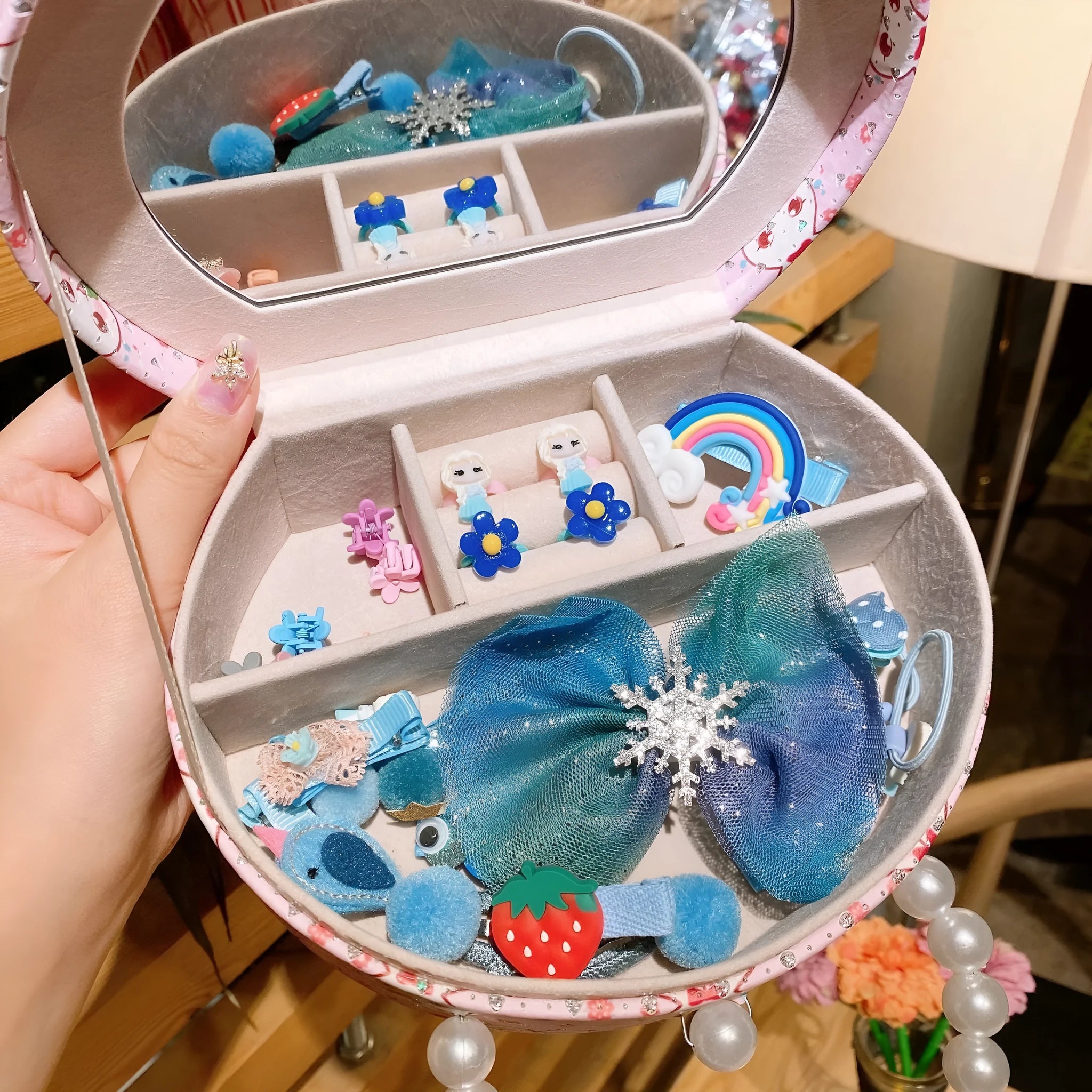 Cocoli series children's hair jewellery gift box open to show 26 colourful cloth hair clips and headdress pieces.