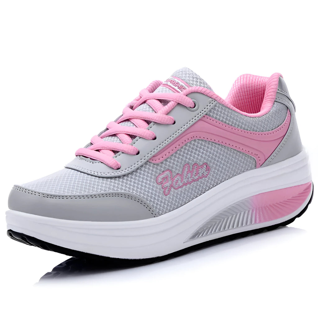 Women's low-heel sports shoe in a choice of colours including black, blue, pink, and purple.