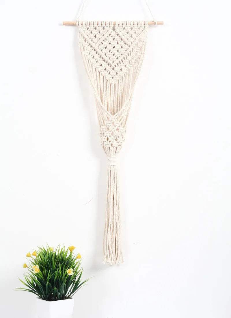 White hand-woven cotton net bag wall tapestry with grid pattern, 30x70cm rectangle.