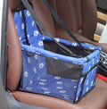Cloth pet car bag with safety tether and geometric pattern, shown on a car seat.