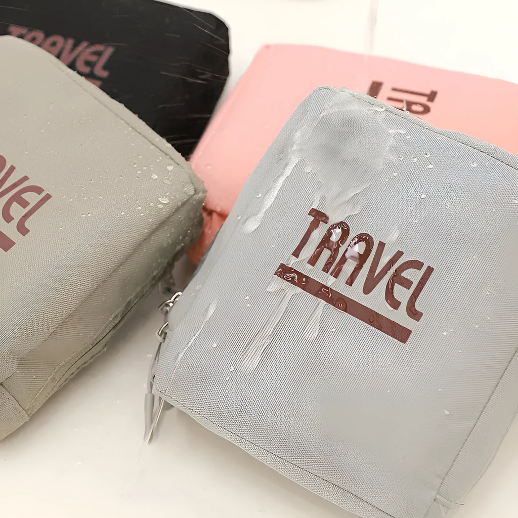 Black sealable cube travel bag made from Oxford cloth for clothing storage.