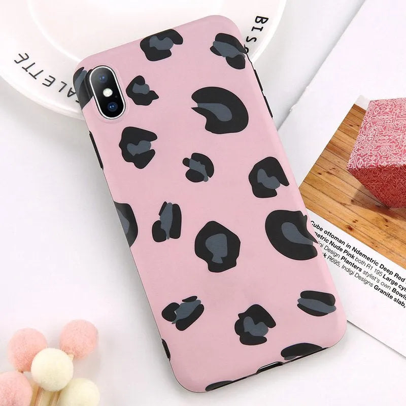 Leopard print pattern protective back cover case for iPhone, shown in black, blue, and pink colour options.