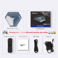 Android 8K TV set-top box with remote control, HD cable, and power adapter on a table.