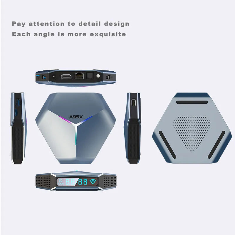 Black Android TV set-top box with remote control, HDMI cable, and international power adapters on a table.