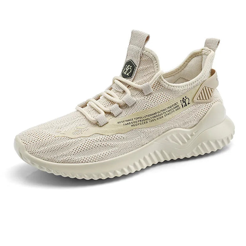 Men's low-top white mesh sports shoes with rubber sole on a plain background
