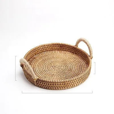 Round handwoven rattan basket with wooden handle in natural colour