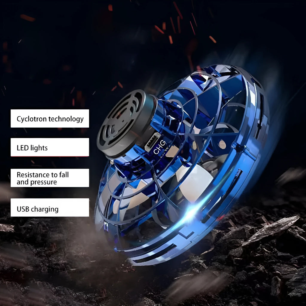 Blue rotating flying gyro induction drone toy made of plastic, 4x8cm, held in hand showing its compact size