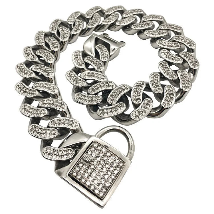 Adjustable stainless steel dog collar with diamond buckle in gold finish on white background