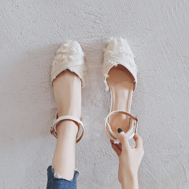 Women's apricot suede D'Orsay flats with ankle strap and 3cm low block heel on a plain background.