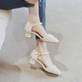 Women's apricot suede D'Orsay flats with ankle strap and 3cm low block heel on a plain background.