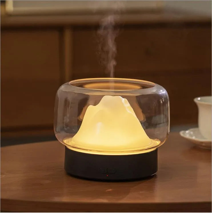 Blue Home Mountain View Aroma Diffuser vase style on table with nano water replenishing device