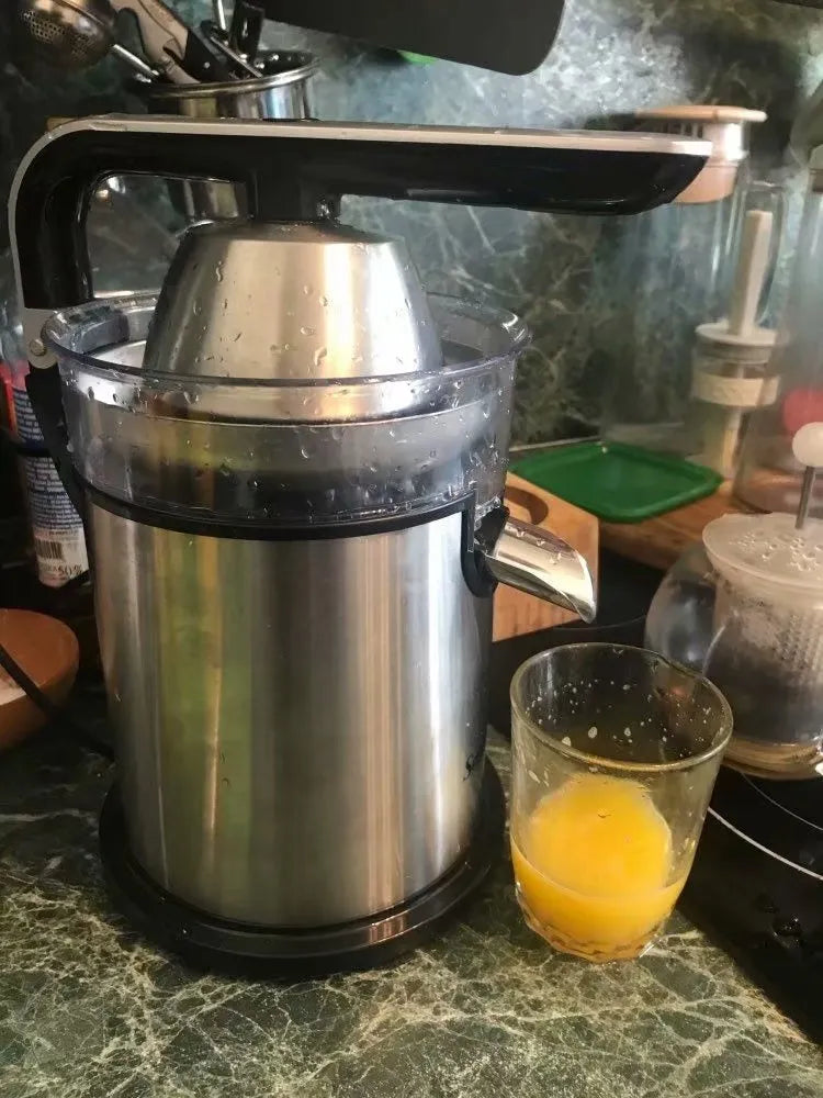 Red electric lemon juicer with 401-600mL capacity, plastic body, round feed port, and EU plug