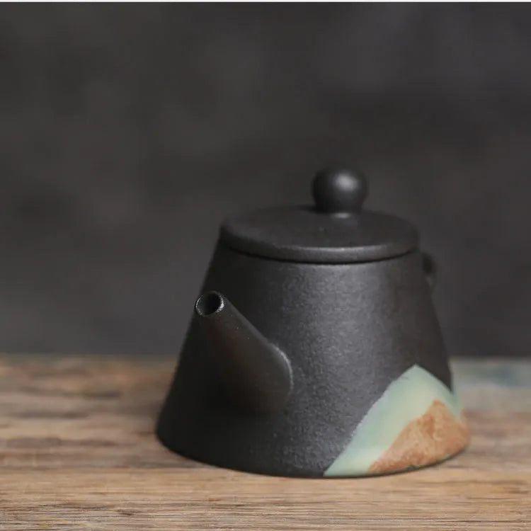 Black ceramic single teapot with underglaze colour finish in retro Japanese household style