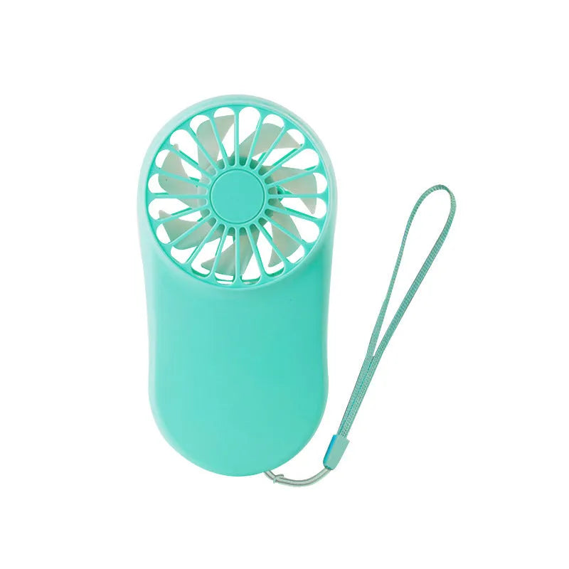 Hands-free wearable neck fan with dual blades and a lanyard, shown in multiple colour options on a table.