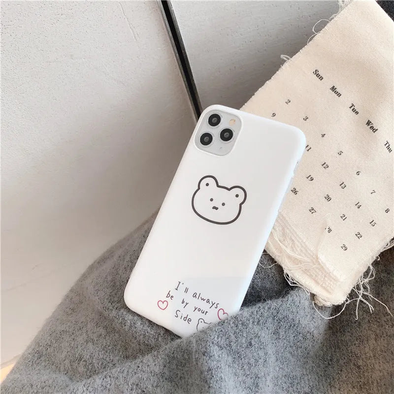 Cartoon bear design on a soft silicone back cover case for an Apple iPhone.