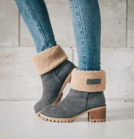 Women's mid-calf suede snow boots with a low flat heel and round toe in various colours.