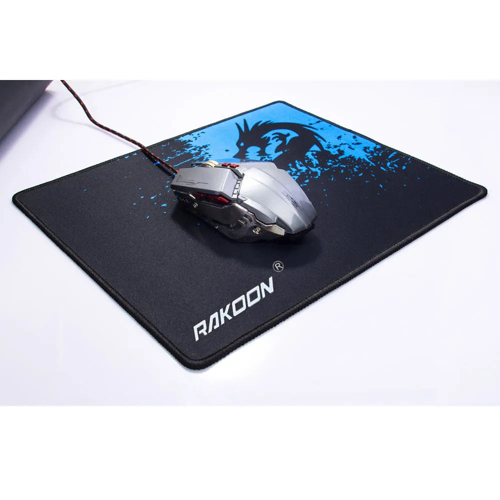 Mouse pad with textured surface and reinforced stitching edges on a desk