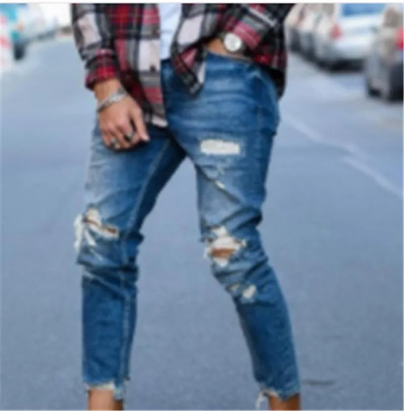 Men's distressed blue jeans with hole detailing in cotton fabric