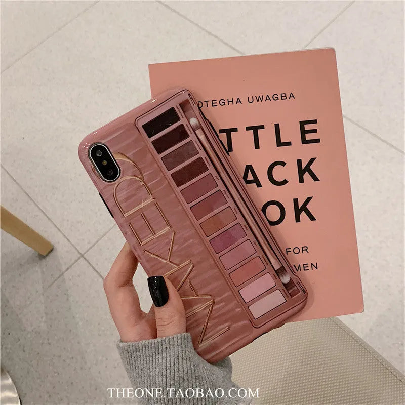Flesh coloured silicone iPhone case with an eye shadow pattern design on the back.