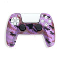 Camouflage patterned silicone protective case fitted on a black Sony PS5 DualSense controller.