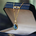 Gold geometric copper pendant necklace on a chain, retro French style.