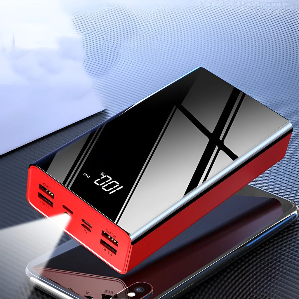 Black or red 40000 mAh power bank with digital LCD screen showing battery percentage.