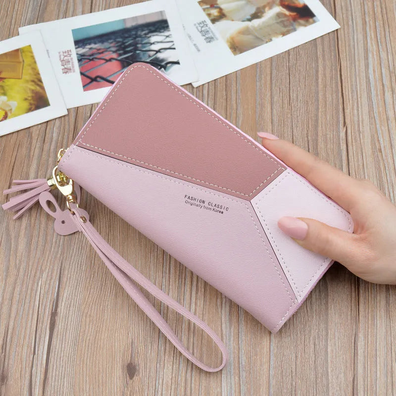 Women's long zipper tassel clutch bag with stitching detail in Black, Blue or Pink, horizontal square shape.