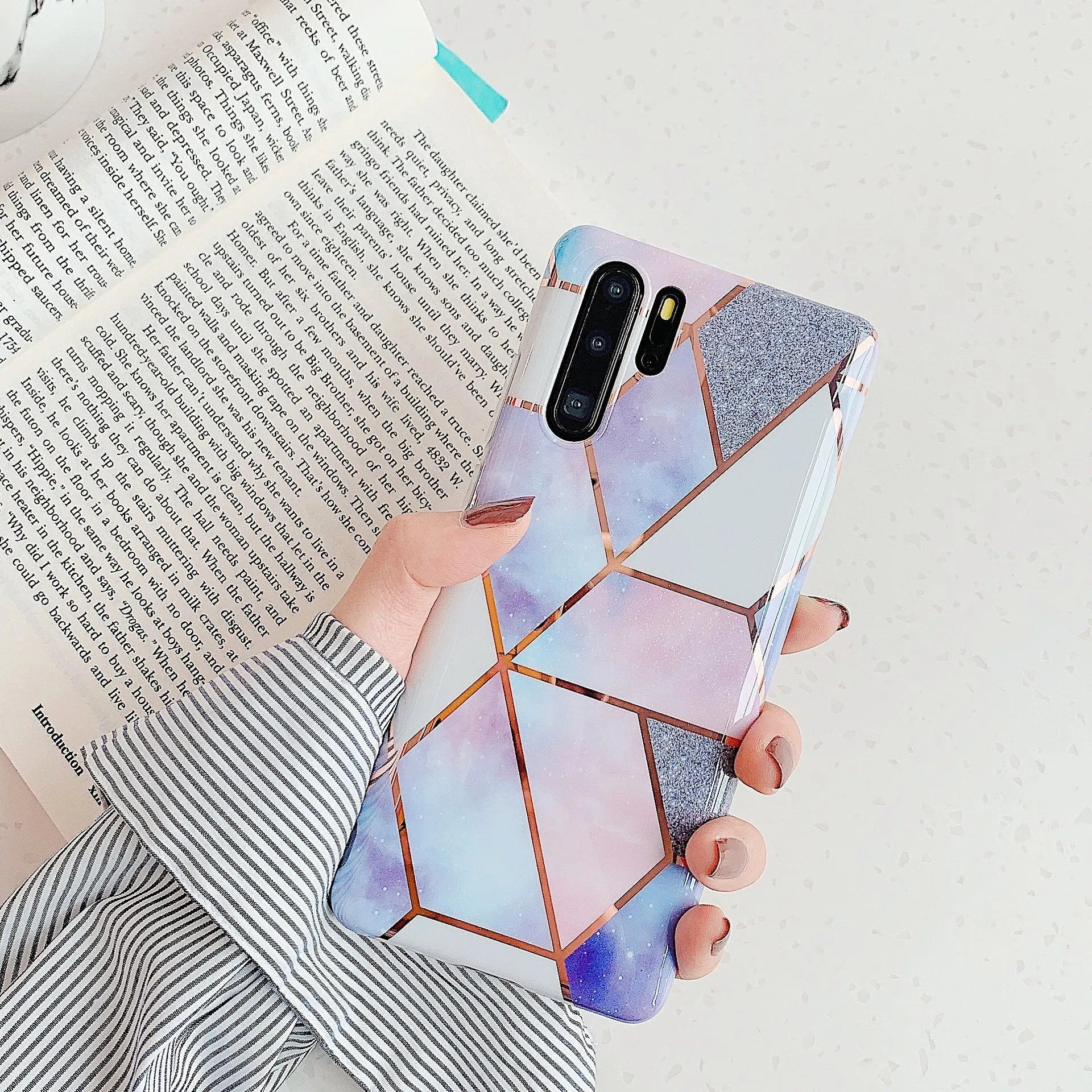 Electroplated marble design phone case for Huawei and Samsung smartphones in various colours.
